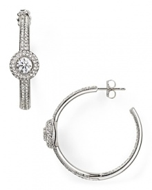 Pave-set crystals and a delicate shape elevate these classic rhodium-plated hoop earrings from Nadri from ordinary to opulent. Pave-set crystals and a delicate shape elevate these classic rhodium-plated hoop earrings from Nadri from ordinary to opulent.