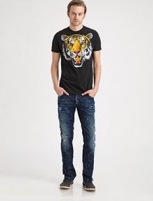 Distressed, slim-fit jeans in a five-pocket style with logo detail on back pocket.Front zipper and buttonBelt loopsFive-pocket styleDistressed, front and backBack pocket with logo detailInseam, about 3498% cotton/2% elastaneMachine washMade in Italy