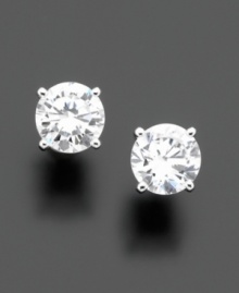 Convey timeless elegance with sparkling round-cut cubic zirconias (1-1/2 ct. t.w.). B. Brilliant earrings crafted in sterling silver with rhodium plating.