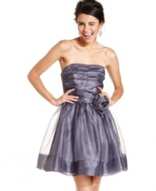 Designed for an unforgettable night, this strapless dress from B Darlin charms with its shimmery overlay and full a-line shape! Designed for an unforgettable night, this strapless dress from B Darlin charms with its shimmery overlay and full a-line shape!