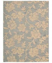 Uplifting style. Nourison's Skyland rug features lush, dreamy florals rendered in soft blue and beige shades, bringing a heavenly feel to any space. The plush wool rug is enhanced with meticulous hand carving for beautiful detail and texture.