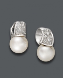 Say hello to elegance. Belle de Mer stud earrings feature a luxurious mix of cultured freshwater pearls (9-10 mm) and sparkling, round-cut diamonds (1/5 ct. t.w.) in a 14k white gold wave setting. Approximate drop: 3/8 inch. Say hello to elegance. Belle de Mer stud earrings feature a luxurious mix of cultured freshwater pearls (9-10 mm) and sparkling, round-cut diamonds (1/5 ct. t.w.) in a 14k white gold wave setting. Approximate drop: 3/8 inch.