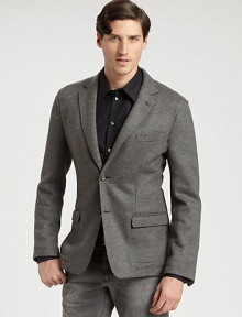 A dapper look is inevitable with this svelte design in smooth virgin wool. Notch lapelFront button closure Long button cuff sleeves Chest pocket Front flap pockets Tailored seams Back dual vented hem About 28 from shoulder to hem Virgin wool Dry clean Made in Italy of imported fabric A dapper look is inevitable with this svelte design in smooth virgin wool. Notch lapelFront button closure Long button cuff sleeves Chest pocket Front flap pockets Tailored seams Back dual vented hem About 28 from shoulder to hem Virgin wool Dry clean Made in Italy of imported fabric