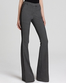 Flaunt chic style with these flared Rachel Zoe pants finished with classic tuxedo stripes. Flaunt chic style with these flared Rachel Zoe pants finished with classic tuxedo stripes.