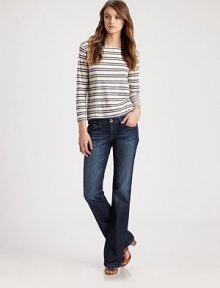 Dark rinse denim, lightly whiskered and faded in a petite bootcut silhouette.THE FITFitted through hips and thighsRise, about 7¼Inseam, about 30THE DETAILSZip flyFive-pocket styleSignature stitch back patch pockets70% cotton/28% lyocell/2% polyurethaneMachine washMade in USA of imported fabricModel shown is 5'9½ (176cm) wearing US size 4. Dark rinse denim, lightly whiskered and faded in a petite bootcut silhouette.THE FITFitted through hips and thighsRise, about 7¼Inseam, about 30THE DETAILSZip flyFive-pocket styleSignature stitch back patch pockets70% cotton/28% lyocell/2% polyurethaneMachine washMade in USA of imported fabricModel shown is 5'9½ (176cm) wearing US size 4.