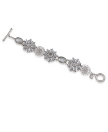 Flower power. A fanciful floral motif defines Carolee's stunning flex bracelet. Crafted in silver tone mixed metal, it's elaborately adorned with glittering glass and epoxy accents. Approximate length: 7-1/2 inches. Flower power. A fanciful floral motif defines Carolee's stunning flex bracelet. Crafted in silver tone mixed metal, it's elaborately adorned with glittering glass and epoxy accents. Approximate length: 7-1/2 inches.