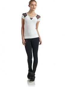 THE LOOKScoopneckInverted triangular mesh inset at frontMesh insets at sleeves and backShort sleevesTHE FITAbout 21 from shoulder to hemTHE MATERIALMicromodal/spandexCARE & ORIGINMachine washMade in USAModel shown is 5'8 (172½cm) wearing US size Small. THE LOOKScoopneckInverted triangular mesh inset at frontMesh insets at sleeves and backShort sleevesTHE FITAbout 21 from shoulder to hemTHE MATERIALMicromodal/spandexCARE & ORIGINMachine washMade in USAModel shown is 5'8 (172½cm) wearing US size Small.