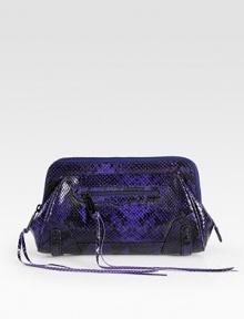 A bold style in python print leather with a secure zip closure .Top zip closureOne outside zip pocketOne inside zip pocketCotton lining10¾W X 6½H X 2DImported A bold style in python print leather with a secure zip closure .Top zip closureOne outside zip pocketOne inside zip pocketCotton lining10¾W X 6½H X 2DImported