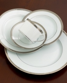 The neoclassical, geometric motif of the dinner plates from Bernardaud's Athena Collection brings a modern allure to your table. Luminous bands of platinum ring this pattern while matte concentric squares dramatically accent the outer rims and create subtle texture and movement. The neoclassical, geometric motif of the dinner plates from Bernardaud's Athena Collection brings a modern allure to your table. Luminous bands of platinum ring this pattern while matte concentric squares dramatically accent the outer rims and create subtle texture and movement.