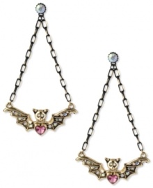 Rule the night. These nocturnal earrings from Betsey Johnson feature a bat wing design embellished with pink and clear crystal accents. Crafted in antiqued gold tone mixed metal. Approximate drop: 3 inches.