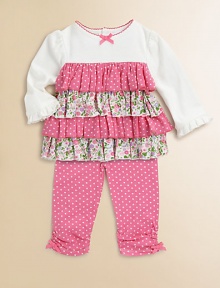 Ruffly tiers alternate from pretty posies to perky polka dots in this charming knit top, paired with dotted pants, scrunched at the ankles. TopRound neckline with scalloped embroidered trim and a tiny bowSoftly gathered shouldersLong sleeves with ruffled cuffsTiered bodyBack buttons Pants Elastic waistbandSlim fitScrunched ankles with bowsCottonMachine washImported Please note: Number of buttons may vary depending on size ordered. Ruffly tiers alternate from pretty posies to perky polka dots in this charming knit top, paired with dotted pants, scrunched at the ankles. TopRound neckline with scalloped embroidered trim and a tiny bowSoftly gathered shouldersLong sleeves with ruffled cuffsTiered bodyBack buttons Pants Elastic waistbandSlim fitScrunched ankles with bowsCottonMachine washImported Please note: Number of buttons may vary depending on size ordered.