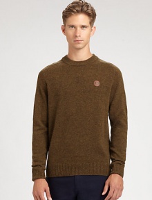 A classic crewneck pullover with a rich, textured finish lending a dapper effect to a casual pullover look.CrewneckRibbed knit collar, cuffs and hemLambswoolDry cleanImportedThis style runs true to size. We recommend ordering your usual size for a standard fit. 