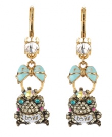Whimsical and wonderful! A charming love frog and a dainty bow adorn these delightful drop earrings from Betsey Johnson. Embellished with glittering crystals galore, they're crafted in antique gold tone mixed metal. Approximate drop: 1-3/4 inches. Whimsical and wonderful! A charming love frog and a dainty bow adorn these delightful drop earrings from Betsey Johnson. Embellished with glittering crystals galore, they're crafted in antique gold tone mixed metal. Approximate drop: 1-3/4 inches.