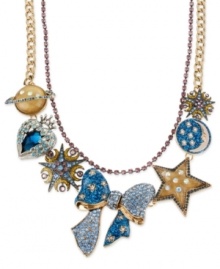 Everything ties together in this multi-charm frontal necklace from Betsey Johnson. Crafted from gold-tone mixed metal, the necklace is adorned with whimsical charms featuring glitter and glass crystal accents, as well as a big bow charm in the center. Approximate length: 16 inches + 3 inch extender. Approximate drop: 2 inches.