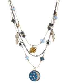 Lunar love. Betsey Johnson's illusion necklace is crafted from antique gold- and hematite-tone mixed metal, with glitter and glass crystal accents in orbit around a blue glitter moon medallion. Approximate length: 16 inches + 3-inch extender. Approximate drop: 3-1/2 inches. Lunar love. Betsey Johnson's illusion necklace is crafted from antique gold- and hematite-tone mixed metal, with glitter and glass crystal accents in orbit around a blue glitter moon medallion. Approximate length: 16 inches + 3-inch extender. Approximate drop: 3-1/2 inches.