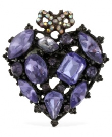A heartfelt gesture. This stretch ring from Betsey Johnson is crafted from hematite-tone mixed metal with purple glass crystal gems and a bow accent on top to enhance the appeal. Size 7-1/2.