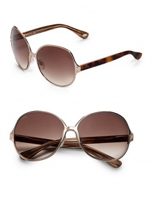 THE LOOKMetal round style Etched logo on lens Logo accented temples UVA and UVB protectionSignature case includedTHE COLORGold with gradient brown lensesORIGINMade in Italy THE LOOKMetal round style Etched logo on lens Logo accented temples UVA and UVB protectionSignature case includedTHE COLORGold with gradient brown lensesORIGINMade in Italy