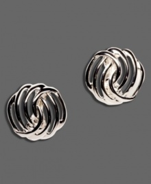 Admirable accents for everyone! Highlight your look with these stylish silver tone mixed metal clip on earrings by Monet.