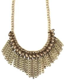 Chain reaction. A chic array of chains stands out on this striking statement necklace from BCBGeneration. Adorned with glass accents in a smokey topaz hue, it's crafted in antique gold tone mixed metal. Approximate length: 17 inches. Approximate drop: 2 inches.