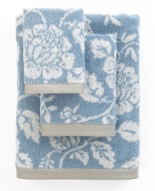 Sweet serenity. Offering a romantic and elegant composition for your bath space, this Aquarelle bath towel features pretty blooms in soft blue hues. Sweet serenity. Offering a romantic and elegant composition for your bath space, this Aquarelle bath towel features pretty blooms in soft blue hues.
