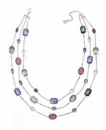 The perfect palette. This layered Swarovski necklace presents three rows of crystals on silver tone mixed metal chains. Crystals sparkle in a stunning gradation of warm pastel colors. Approximate length: 14-7/8 inches.