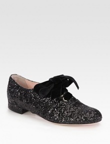 An oversized velvet bow adorns this glittery on-the-go essential. Glitter-coated fabric upperLeather lining and solePadded insoleMade in Italy An oversized velvet bow adorns this glittery on-the-go essential. Glitter-coated fabric upperLeather lining and solePadded insoleMade in Italy