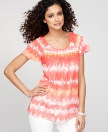 A pointilist-inspired dot print decorate waves of bold color on Style&co.'s basketweave top. Fluttering sleeves and a relaxed fit give this piece a soft, feminine look. A pointilist-inspired dot print decorate waves of bold color on Style&co.'s basketweave top. Fluttering sleeves and a relaxed fit give this piece a soft, feminine look.