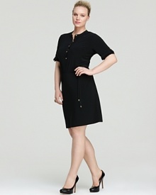 Master utilitarian city-chic in this Calvin Klein Plus shirt dress. A pared-down silhouette sets the framework for smart, strong dressing, whether you're headed to cocktails or the corner office.