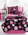 Pretty in pink! Style gone wild in this Zahara comforter set, featuring a herd of zebra, cheetah and crocodile prints in a palette of hot pink, black and white. Comes complete with all reversible pieces for a plethora of styling options to keep your room fun and fresh.