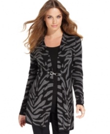 Make this tunic-length petite sweater from Charter Club the center of attention in your fall wardrobe! The wild animal print adds extra oomph. Make this tunic-length petite sweater from Charter Club the center of attention in your fall wardrobe! The wild animal print adds extra oomph.