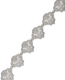 Well-rounded elegance. This Eliot Danori bracelet is decorated with rows of swooping designs embellished with round-cut crystal accents and cubic zirconias (2-3/4 ct. t.w.). Set in rhodium-plated mixed metal. Approximate length: 7-1/4 inches. Well-rounded elegance. This Eliot Danori bracelet is decorated with rows of swooping designs embellished with round-cut crystal accents and cubic zirconias (2-3/4 ct. t.w.). Set in rhodium-plated mixed metal. Approximate length: 7-1/4 inches.