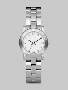 A classic style with a touch of sparkle and an iconic logo bezel. Quartz movementWater resistant to 3 ATMRound stainless steel case, 26mm (1) Logo bezelWhite dialCrystal and numeric hour markersSecond hand Stainless steel link braceletImported A classic style with a touch of sparkle and an iconic logo bezel. Quartz movementWater resistant to 3 ATMRound stainless steel case, 26mm (1) Logo bezelWhite dialCrystal and numeric hour markersSecond hand Stainless steel link braceletImported