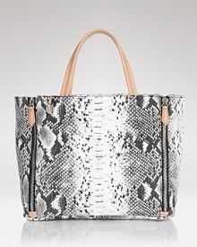 The classic canvas bag is re-rendered for the cool girl in an on-trend python print. Make a serpentine statement with this tote from Sam Edelman. The classic canvas bag is re-rendered for the cool girl in an on-trend python print. Make a serpentine statement with this tote from Sam Edelman.
