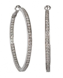 Dazzling round-cut cubic zirconia (2 ct. t.w.) lines every side of these gorgeous CRISLU hoop earrings set in sterling silver with a platinum finish. Approximate diameter: 1-3/4 inches.