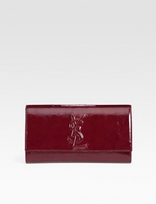A simply elegant clutch in textured patent leather, stitched with the Yves Saint Laurent insignia. Magnetic snap flap closure One inside open pocket Satin lining 10¾W X 6½H X 1¼D Made in Italy A simply elegant clutch in textured patent leather, stitched with the Yves Saint Laurent insignia. Magnetic snap flap closure One inside open pocket Satin lining 10¾W X 6½H X 1¼D Made in Italy