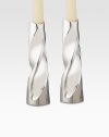 The sleek yet simple design of these twisted-metal alloy candle sticks add impact to every room or occasion. From the Swirl Collection Set of 2 Fits standard taper candles Metal alloy 7½H X 2 diam. Imported 