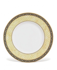 A refreshing complement to the intricate designs of the India dinnerware collection, this bone china accent plate features a warm buttercup border. A refreshing complement to the intricate designs of the India dinnerware collection, this bone china accent plate features a warm buttercup border.