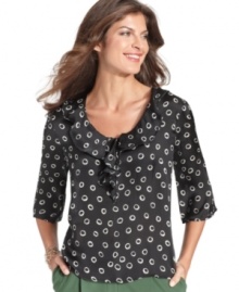 This petite top from Elementz features a grownup take on the polka dot print and a charming ruffled neckline.