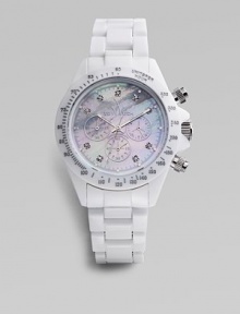 A modern, full-function chronograph with a plasteramic link bracelet and lustrous mother-of-pearl dial. Quartz movement Plastic bezel Round 42 mm case Mother-of-pearl face with three sub dials Crystal hour markers Second hand Imported