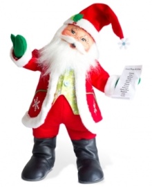 Santa is full of good humor as he checks the last few children off his list. A few flurries add to his traditionally festive attire, designed by Annalee. Position him on your mantel or beside the tree.