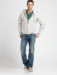 A standard model of the relaxed-straight leg fit with distressed edges and heavy fading for a worn-in look.Five-pocket styleZip flyInseam, about 33½CottonMachine washMade in USA A standard model of the relaxed-straight leg fit with distressed edges and heavy fading for a worn-in look.Five-pocket styleZip flyInseam, about 33½CottonMachine washMade in USA