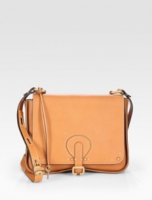 Hand-grained calfskin in a structured flap design finished with rich goldtone hardware.Adjustable shoulder strap, 18½-22 dropBuckle flap closureOne front zip compartmentOne inside zip pocketOne inside open pocketCotton lining10¾W X 7½H X 2½DMade in Italy Hand-grained calfskin in a structured flap design finished with rich goldtone hardware.Adjustable shoulder strap, 18½-22 dropBuckle flap closureOne front zip compartmentOne inside zip pocketOne inside open pocketCotton lining10¾W X 7½H X 2½DMade in Italy