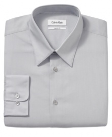 With a smooth finish and expert tailoring, this Calvin Klein shirt looks as good as it feels. With a smooth finish and expert tailoring, this Calvin Klein shirt looks as good as it feels.
