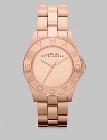 A classic timepiece with a logo etched bezel. Quartz movementWater resistant to 5 ATMRound brushed rose goldtone stainless steel case, 36.5mm (1.5)Logo bezelBrushed rose goldtone dialSecond hand Brushed rose goldtone stainless steel link braceletImported