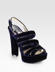 Rich, velvety design with an adjustable slingback, island platform and criss-cross straps. Self-covered heel, 5 (125mm)Island platform, 1 (25mm)Compares to a 4 heel (100mm)Velvet upperLeather liningRubber solePadded insoleImported