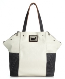 A unique shape combines with a sassy snakeskin print for an ultra chic look ready to take the city by storm. Gunmetal hardware and an oversized dome stud at front add the perfect amount of polish. A unique shape combines with a sassy snakeskin print for an ultra chic look ready to take the city by storm. Gunmetal hardware and an oversized dome stud at front add the perfect amount of polish.