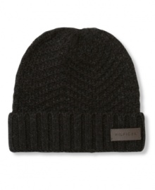 Tommy Hilfiger updates the classic watch cap with this season's herringbone pattern and deep double-ribbed cuff. Tommy Hilfiger updates the classic watch cap with this season's herringbone pattern and deep double-ribbed cuff.
