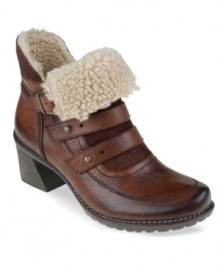 Walk along in the comfortable style of the Mistral faux-fur booties by Earth. They feature buckle and post closures on the vamp and a stacked and asymmetrical heel.