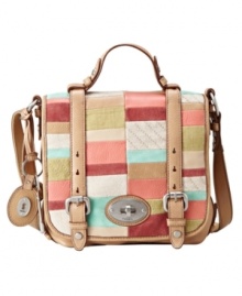 Perfect for weekend fun or a fashionable workday. This flap bag by Fossil will keep you organized while maintaing an urban down-town chic allure. Perfect for weekend fun or a fashionable workday. This flap bag by Fossil will keep you organized while maintaing an urban down-town chic allure.