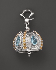 Inspired by Zen philosophy, this polished sterling silver Raja meditation bell from Paul Morelli is set with blue topaz and yellow citrine.